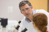 Dr Justin Yerbury and a research assistant in a laboratory