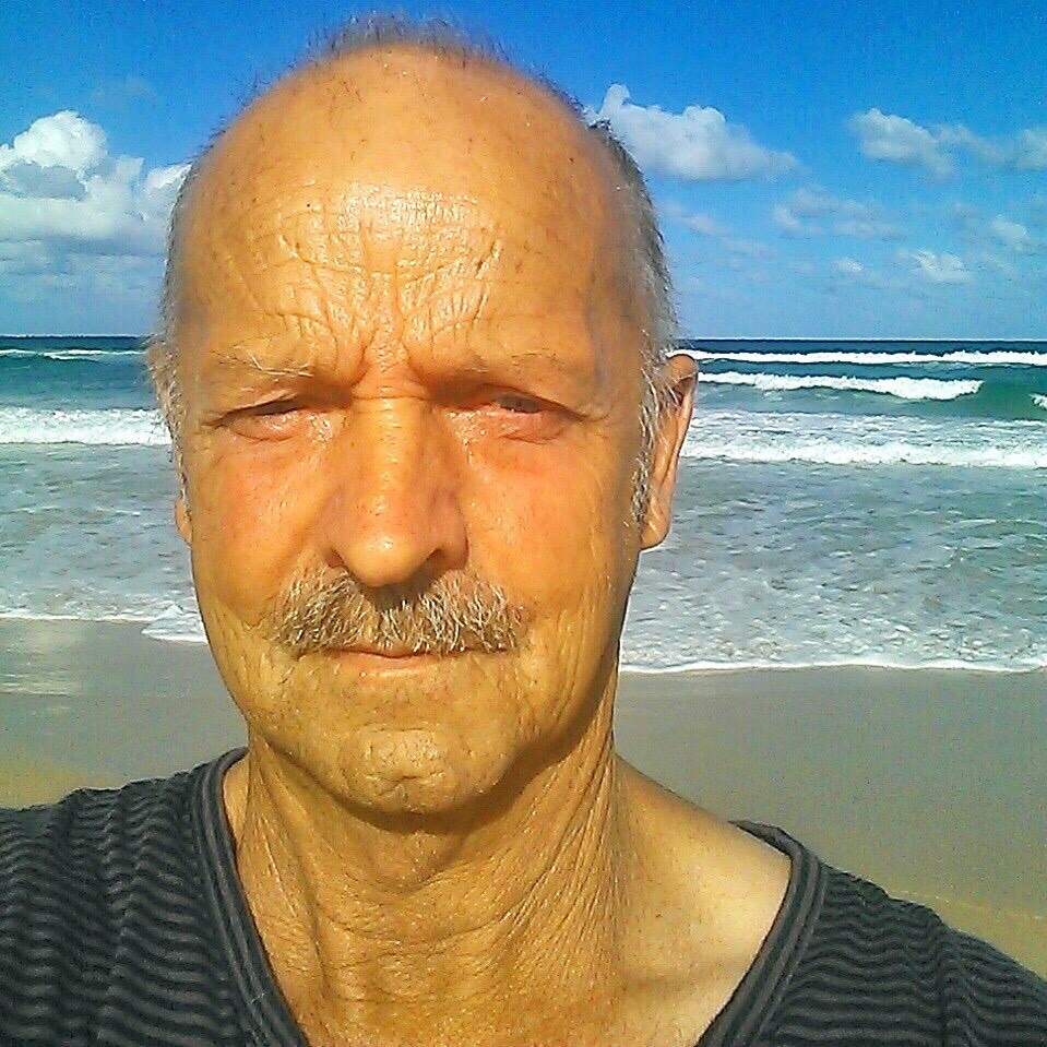 Peter Koenig in a shot from his facebook page at the beach