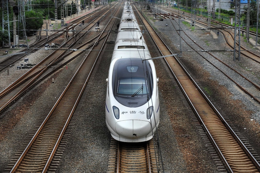 A China Railway High-speed (CRH) Harmony bullet train pulls into the Shenyang Railway Station in Liaoning province.