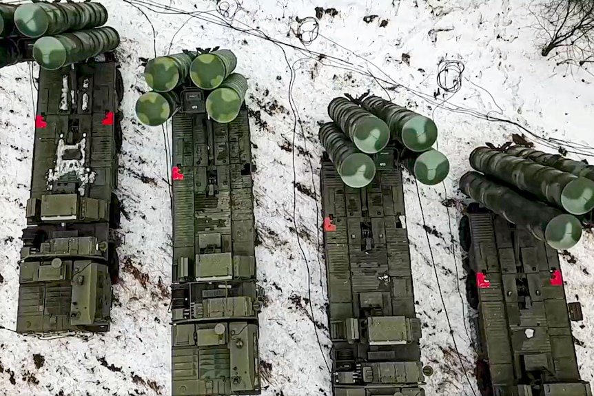Aerial view of military air defence system vehicles.