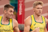 Two Australian decathletes run alongside each other during the 1,500 metres at the Tokyo Olympics.