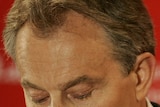 Tony Blair pauses while announcing his resignation