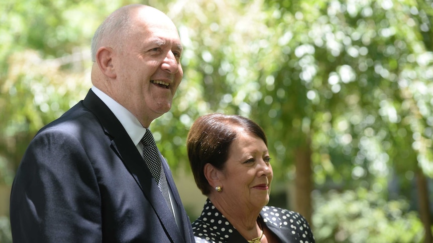 General Peter Cosgrove poses with his wife Lynne after he was named Australia's 26th governor-general.