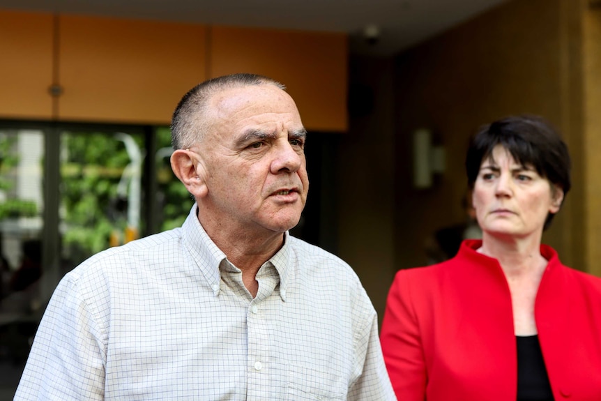 Wayne Muir stands next to Fiona McLeod