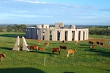 A view across farmland and the Esperance Stonehenge replica.