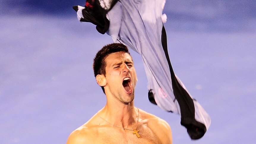 Marathon man ... Novak Djokovic celebrates after beating Rafael Nadal in the 2012 final.