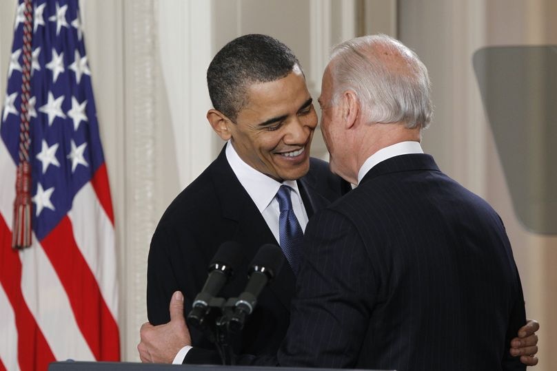 US Vice President Joe Biden (right) whispers a remark to President Barack Obama