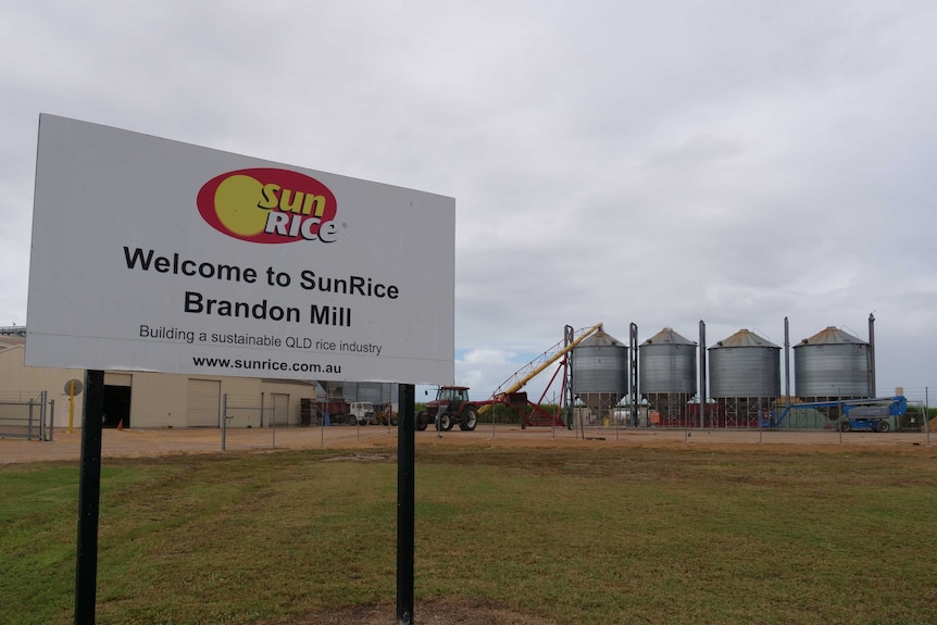A sign outside a rice mill says welcome to Brandon Mill