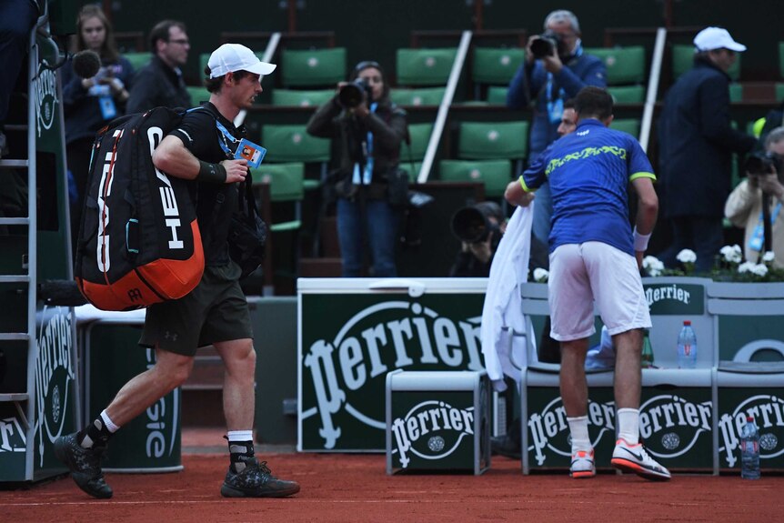 Andy Murray leaves the court