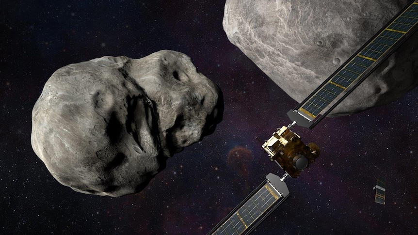 a rock like asteroid hurtles through space while a spacecraft moves towards it