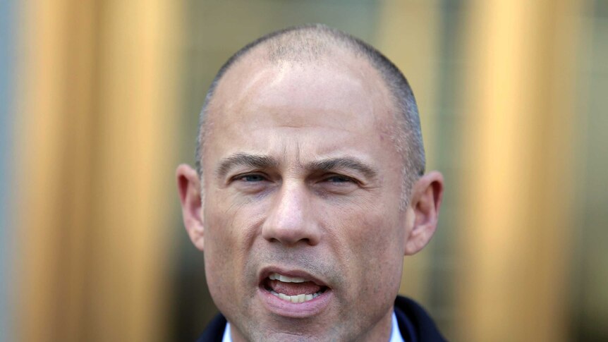 An image of a balding lawyer Michael Avenatti wearing a suit