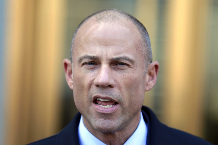 An image of a balding lawyer Michael Avenatti wearing a suit