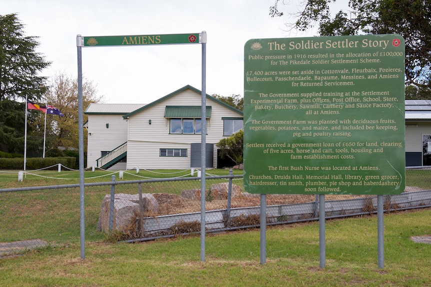 A sign a tthe front of amiens State School dedicated to soldier settlers