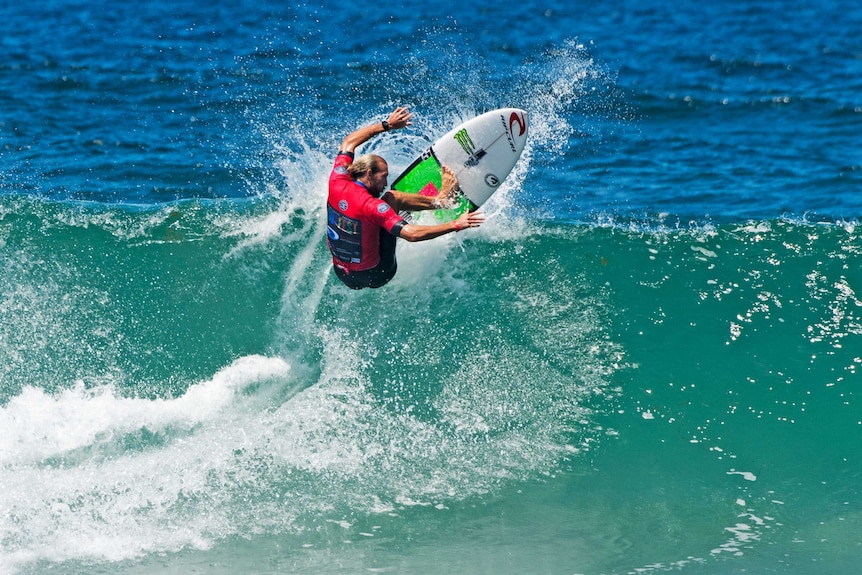 Owen Wright surfs a wave in his comeback appearance at Merewether Beach.