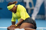 Injury scare ... Serena Williams grimaces in pain on Pat Rafter Arena (Chris Hyde: Getty Images)