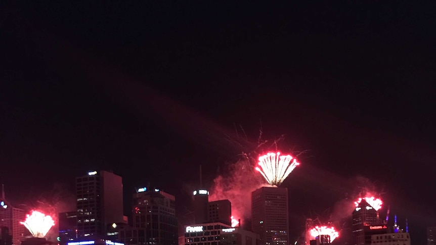Melbourne CBD lights up with fireworks for new year.