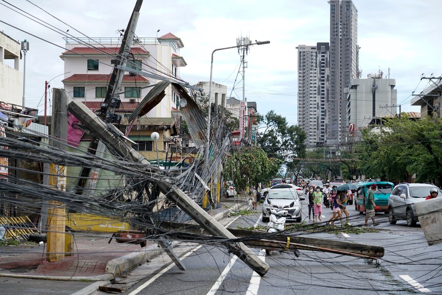 Power lines down on the road after the typhoon hit