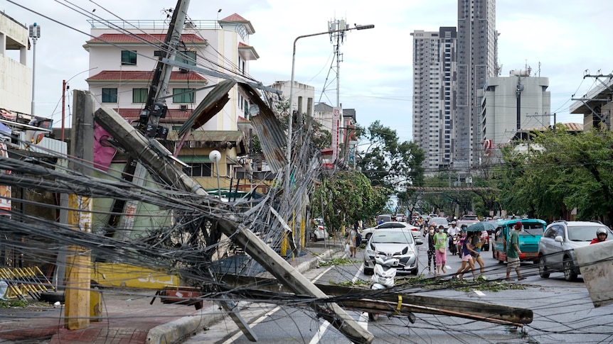 Power lines down on the road after the typhoon hit