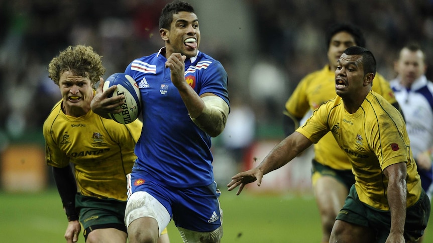 French flair ... winger Wesley Fofana breaks away to score a try.