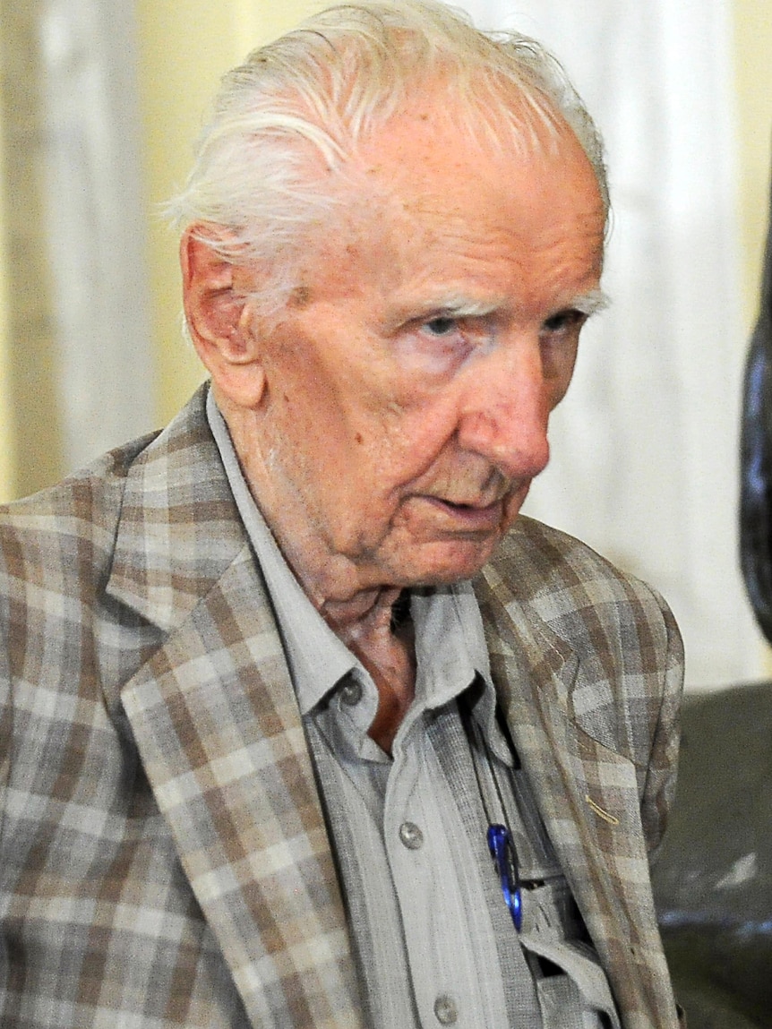 Laszlo Csatary leaves the courthouse in Budapest.