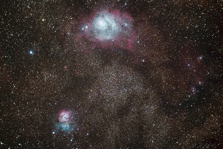The Lagoon Nebula (top right) and Triffid Nebula (bottom left) taken with digital SLR and 80mm telescope.
