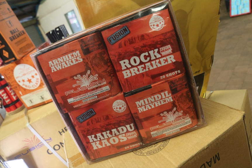 Fireworks with names like Kakadu Kaos and Mindil Mayhem for sale in a box.