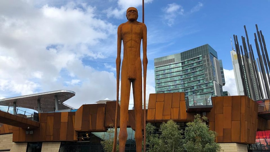 Large sculpture of Aboriginal man