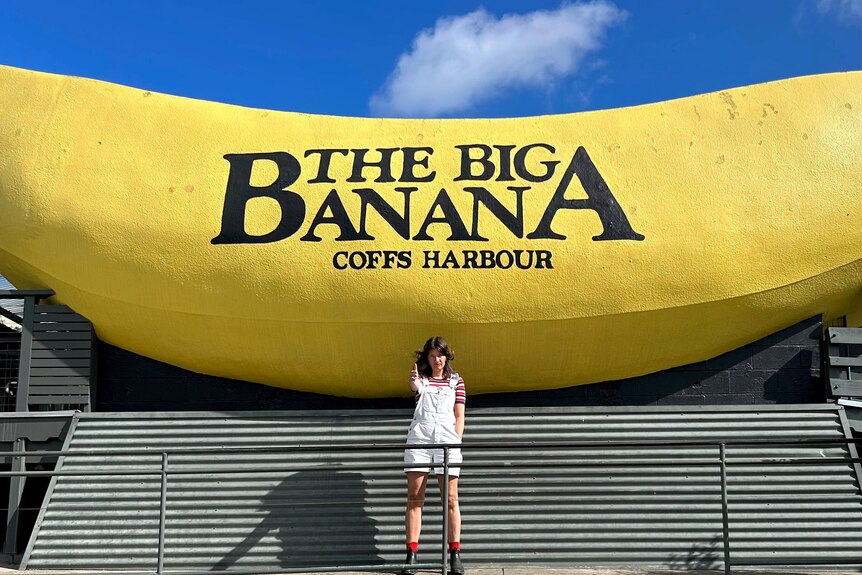 Mel Fulton stands in front of the Big Banana located in Coffs Harbour 