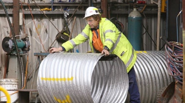 A worker prepares some tunnel lining in Beaconsfield.