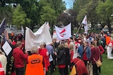 Public sector workers rally over a wage dispute outside Tasmanian Parliament.