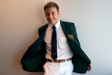 Golden threads ... diver Matthew Mitcham models the Australian team jacket.