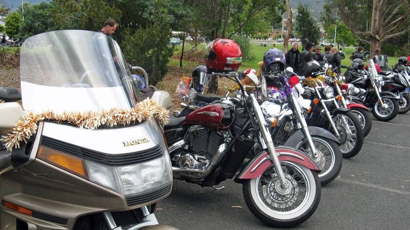 A line of motorcycles with tinsel at the 2009 annual Salvation Army Christmas toy run in Hobart.
