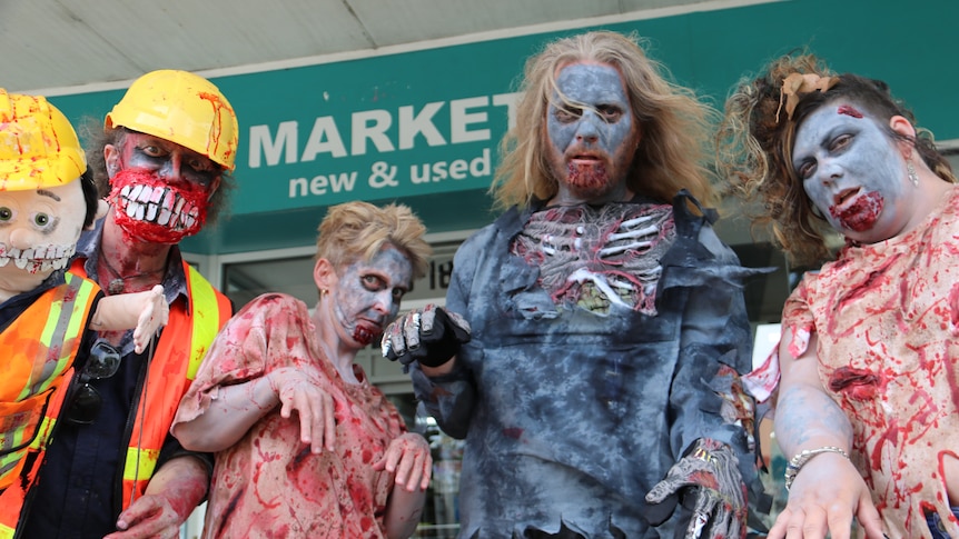people dressed up as zombies parade around warrnambool