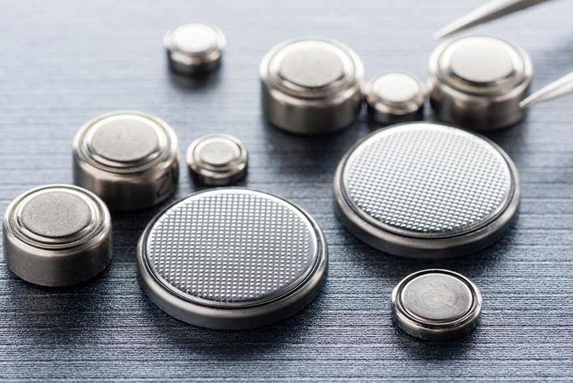 A range of button batteries in different sizes.