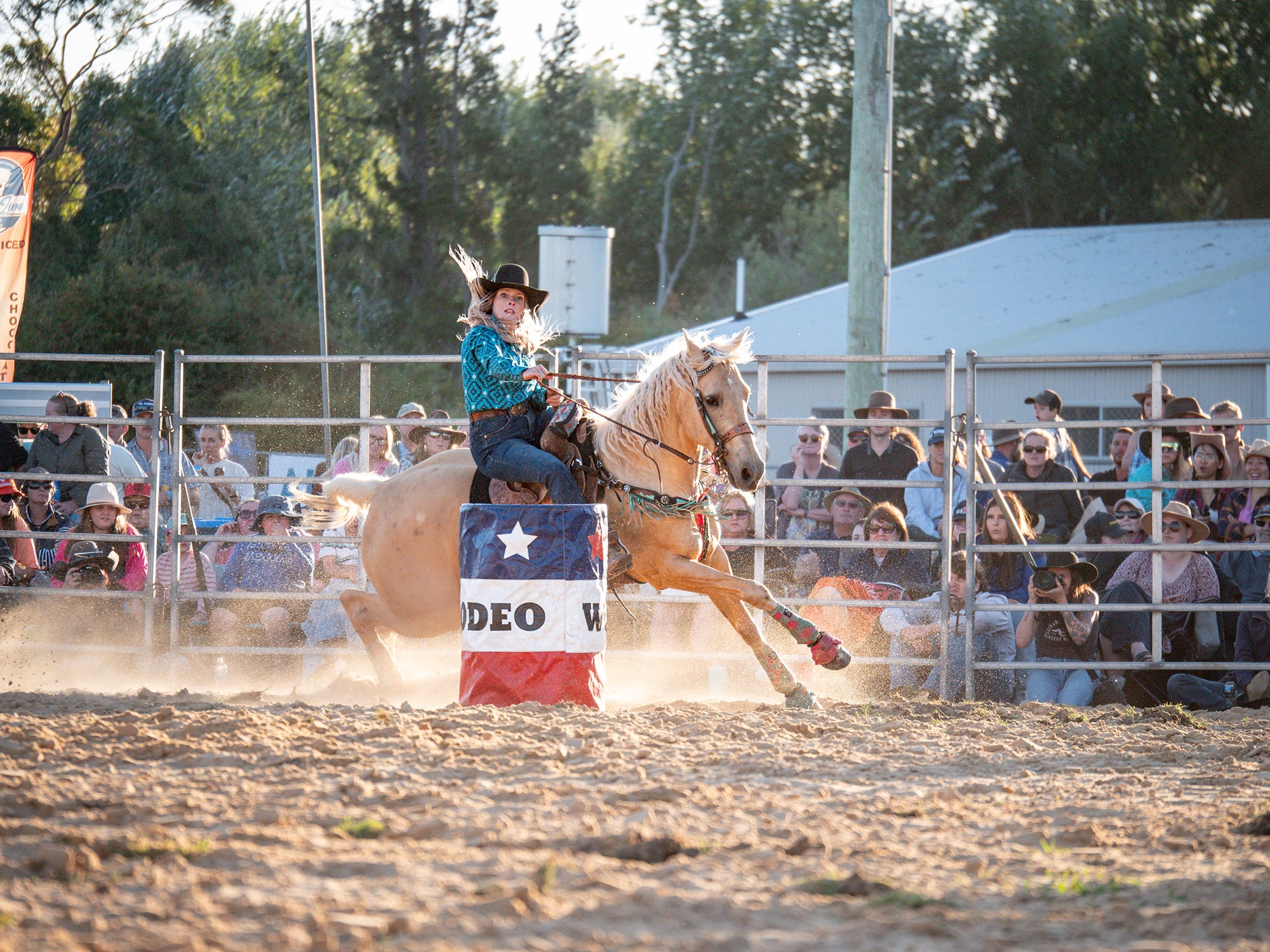 A woman barrel racing