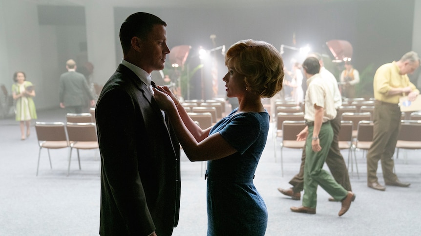 A still from the movie Fly Me to the Moon with Scarlett Johansson and Channing Tatum in 50s clothes in a TV studio