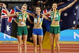 Eleanor Patterson and Nicola Olyslagers hold Australian flags while flanking Ukraine's Yaroslava Mahuchikh