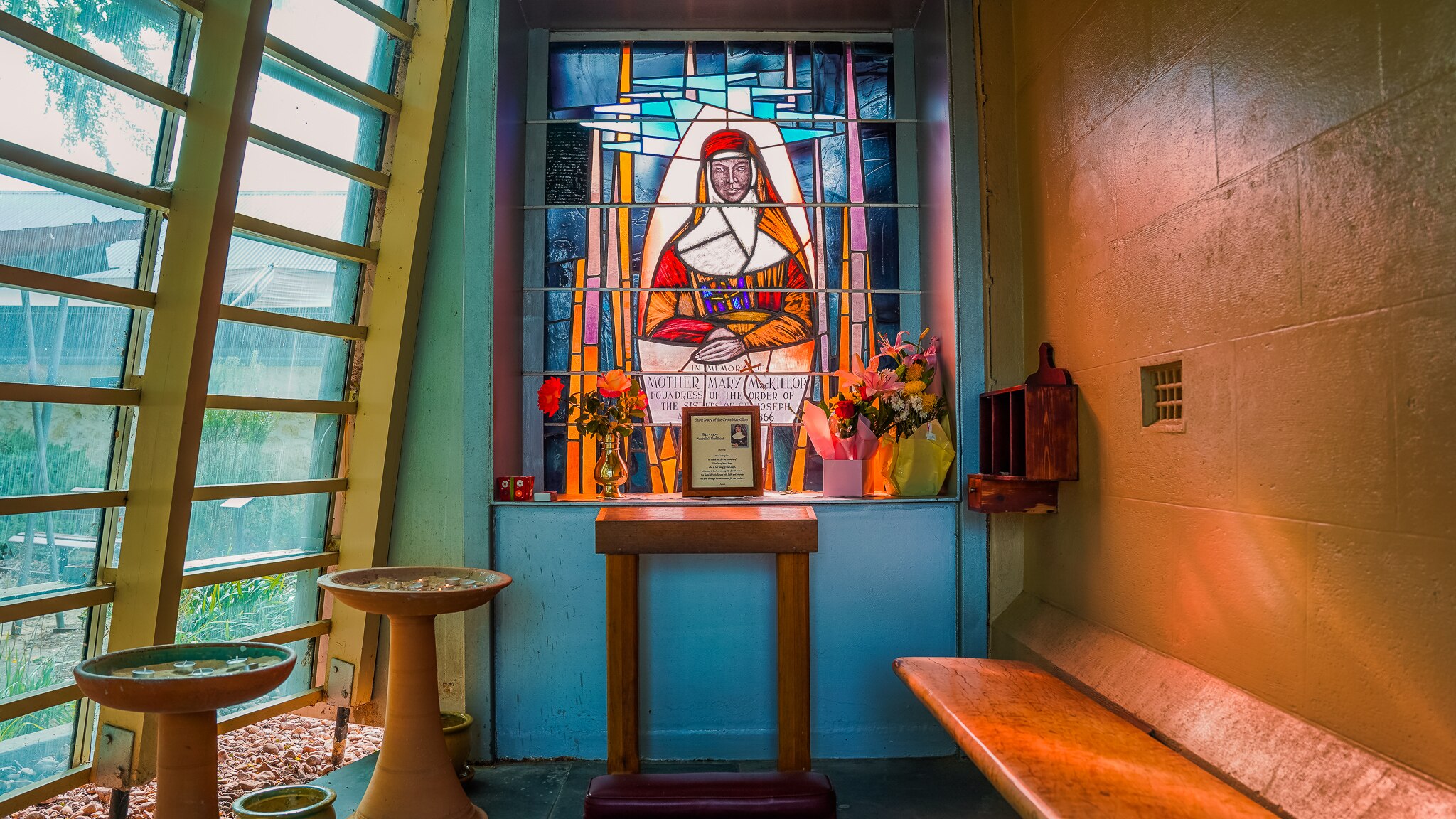A shrine with candles and religious artefacts