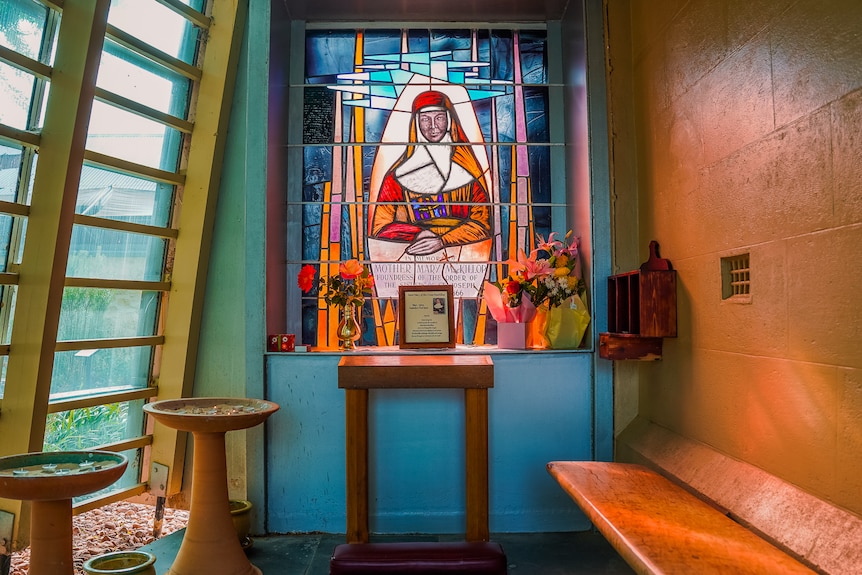 A shrine with candles and religious artefacts