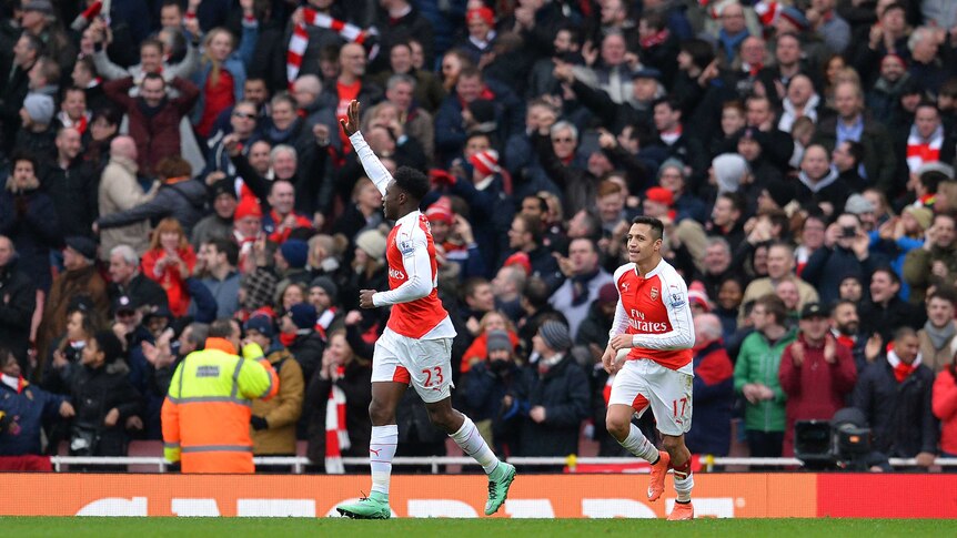 Danny Welbeck celebrates the game winner against Leicester