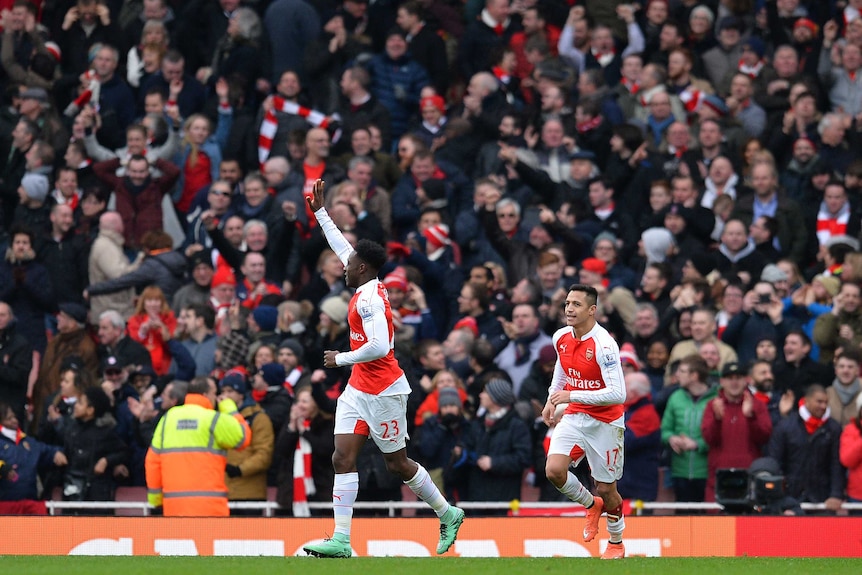Danny Welbeck celebrates the game winner against Leicester