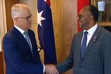 Vanuatu's Prime Minister Charlot Salwai shake hands with Australian Prime Minister Malcolm Turnbull.
