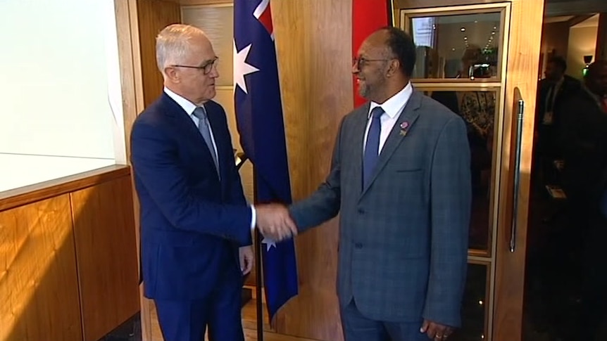 Vanuatu's Prime Minister Charlot Salwai shake hands with Australian Prime Minister Malcolm Turnbull.