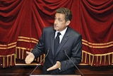 France's President Nicolas Sarkozy delivers a speech at a special congress