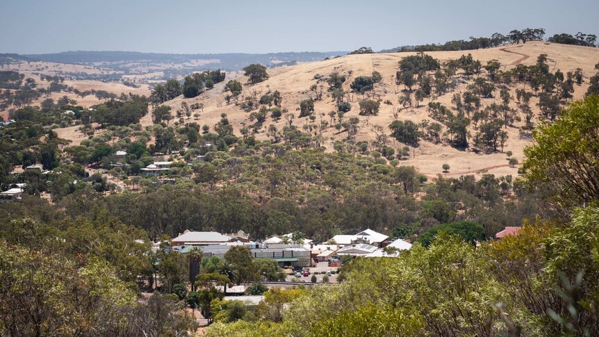 The tiny wheatbelt town of Toodyay, surrounded by hills and trees.