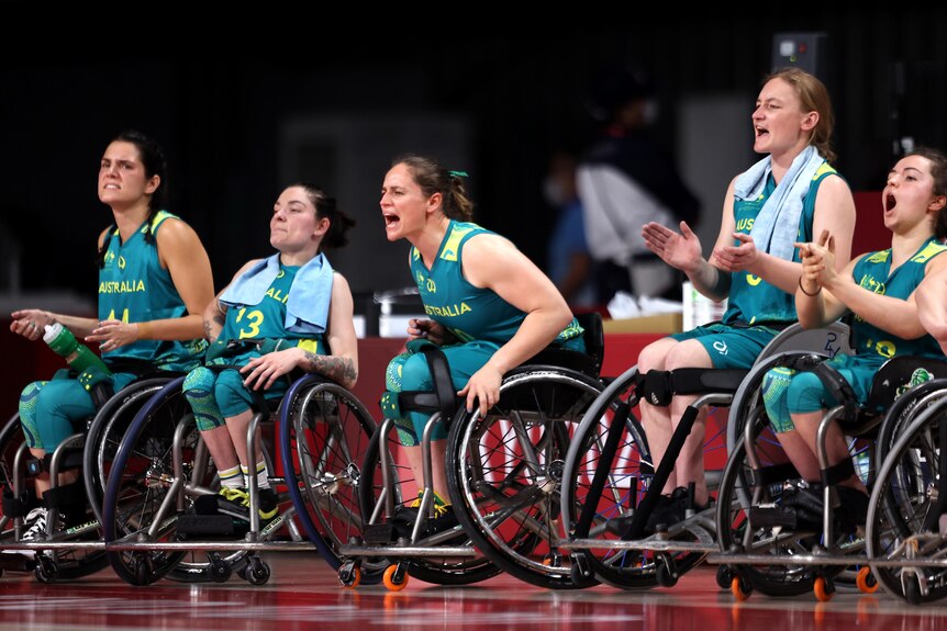  Team Australia celebrate from the bench during the Wheelchair Basketball Women's preliminary round group A match