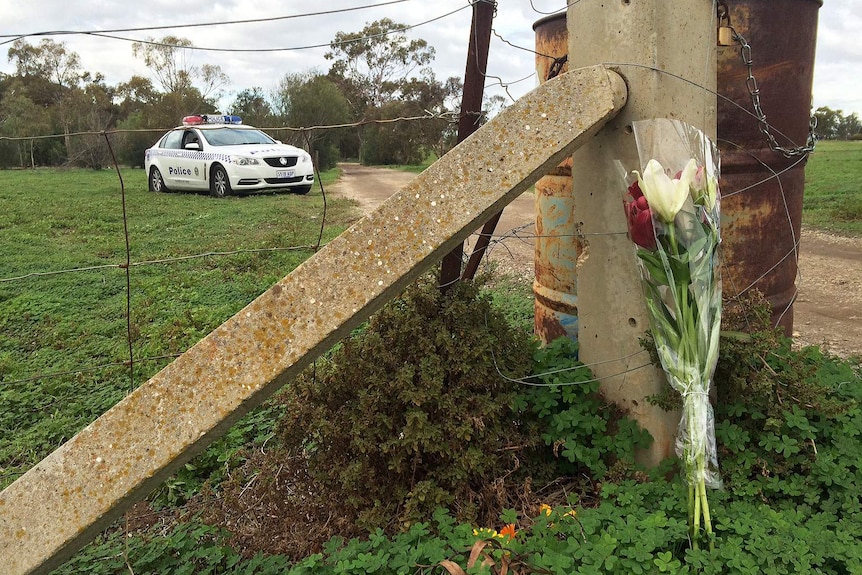 A floral tribute for a mother and two children