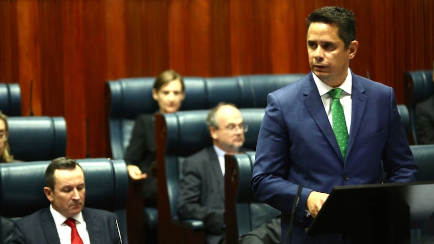 WA Treasurer Ben Wyatt address parliament as Premier Mark McGowan and Labor MPs look on