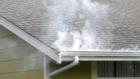 Smoke test to determine if a house is illegally connected to the sewer system.