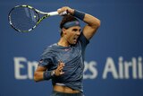 Nadal hits forehand in win over Dutra Silva